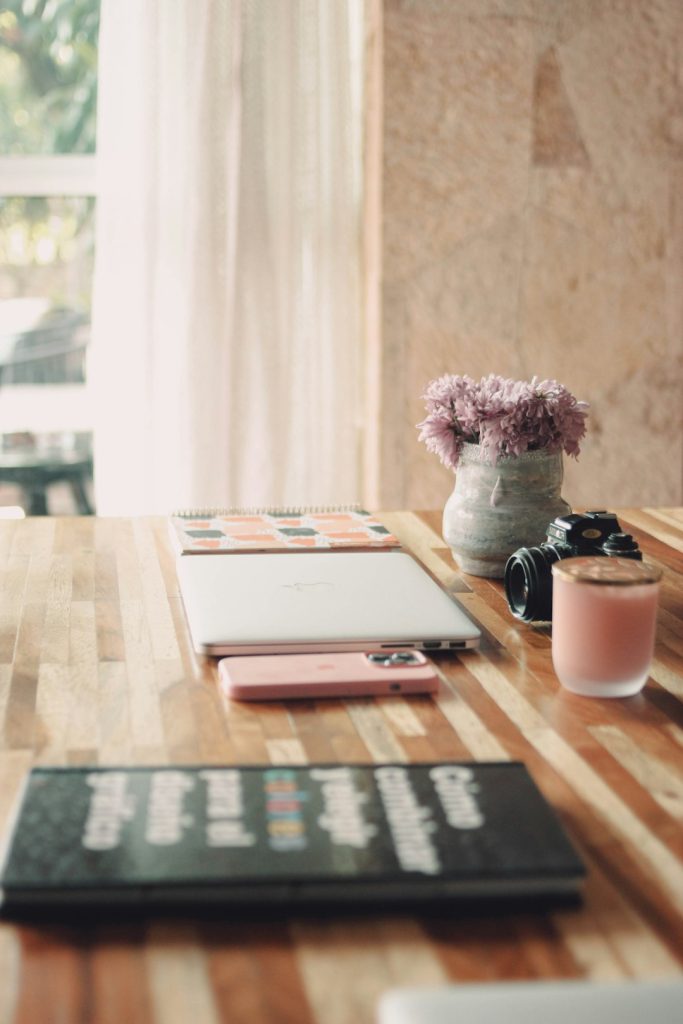 a-tablet-and-a-cup-of-coffee-on-a-table-abrdy8l-m48